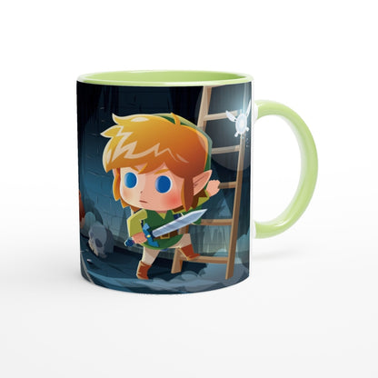 A ceramic mug depicts a chibi Link from The Legend of Zelda: Breath of the Wild and Tears of the Kingdom standing in a dungeon with a fairy nearby.