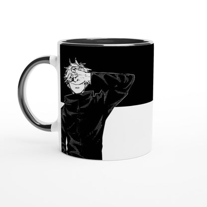 A black and white Jujutsu Kaisen mug depicts Satoru Gojo in a stylized illustration against a yin/yang design.
