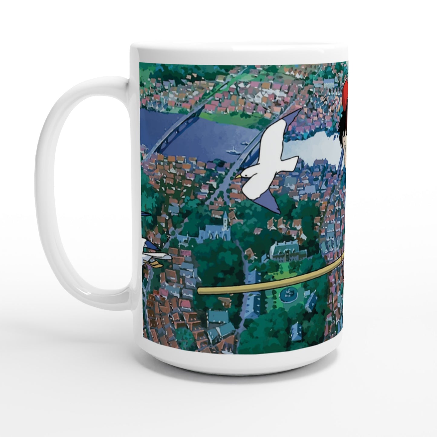 A white mug depicts Kiki flying over Koriko with Gigi, inspired by Studio Ghibli's "Kiki's Delivery Service.