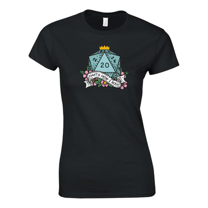 A black fitted t-shirt displays a colorful graphic of a D20 die surrounded by floral elements and reading "That's How I Roll" referencing D&D gameplay.