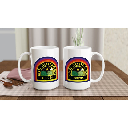 Two white ceramic mugs display a rainbow-colored logo featuring "USCSS Nostromo" and the number "180286," referencing the Alien movie universe.