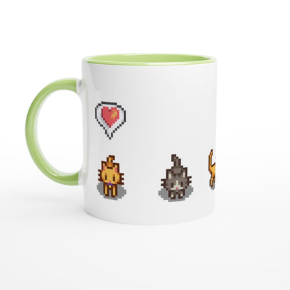 A white mug with a green handle features pixelated graphics of ginger and tabby cats and emotes from Stardew Valley.