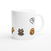 A white mug displays pixelated graphics of a ginger cat, tabby cat, gold coin, and speech bubble from the Stardew Valley computer game.