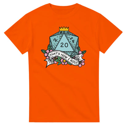 An orange t-shirt displays a D20 die graphic with floral accents and the phrase "That's How I Roll" referencing Dungeons & Dragons.