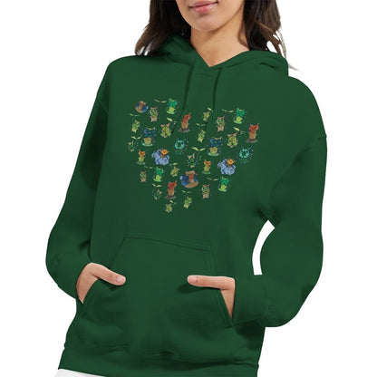 A person wears a dark green hoodie featuring a pattern of Korok characters from The Legend of Zelda: Tears of the Kingdom (TOTK) arranged in the shape of a heart.