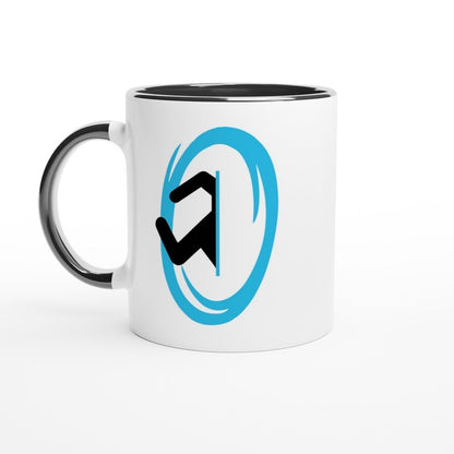 A white ceramic mug displays a blue Portal graphic from the Half-Life video game.