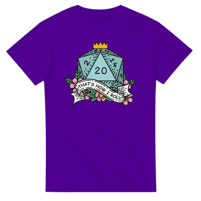A purple t-shirt displays a D20 die graphic with floral accents and the words "That's How I Roll" referencing D&D gameplay.