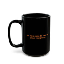 A black mug featuring the Windows 95/98 text It's now safe to turn off your computer.