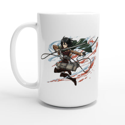 A white ceramic mug displays an illustration of Mikasa Ackerman from the Attack on Titan anime series wielding her sword and grappling hook in a dynamic pose.