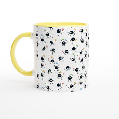 A white 11oz mug features a pattern of black soot sprites, also known as Susuwatari, referencing the Studio Ghibli film Spirited Away.