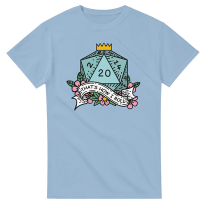 A light blue t-shirt displays a D20 die surrounded by flowers and a banner reading "That's How I Roll," referencing the tabletop game Dungeons & Dragons.