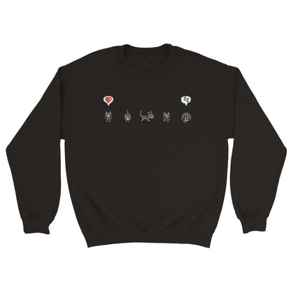 A black unisex crewneck sweatshirt displays a row of grey cats and emotes referencing the Stardew Valley computer game.