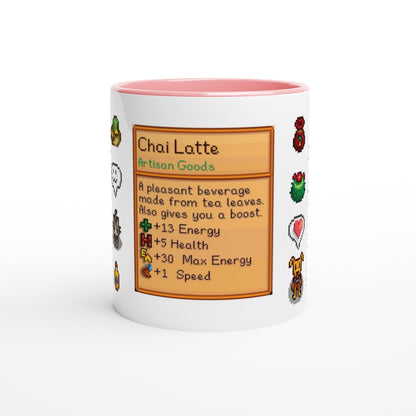A white mug with a red rim displays a Stardew Drinks pattern featuring pixelated sprites and information about a Chai Latte beverage.