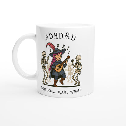 A white mug displays "ADHD & D" at the top and a cartoon illustration of a bard playing a lute surrounded by skeletons, with the phrase "Roll For... Wait, What?" printed below.