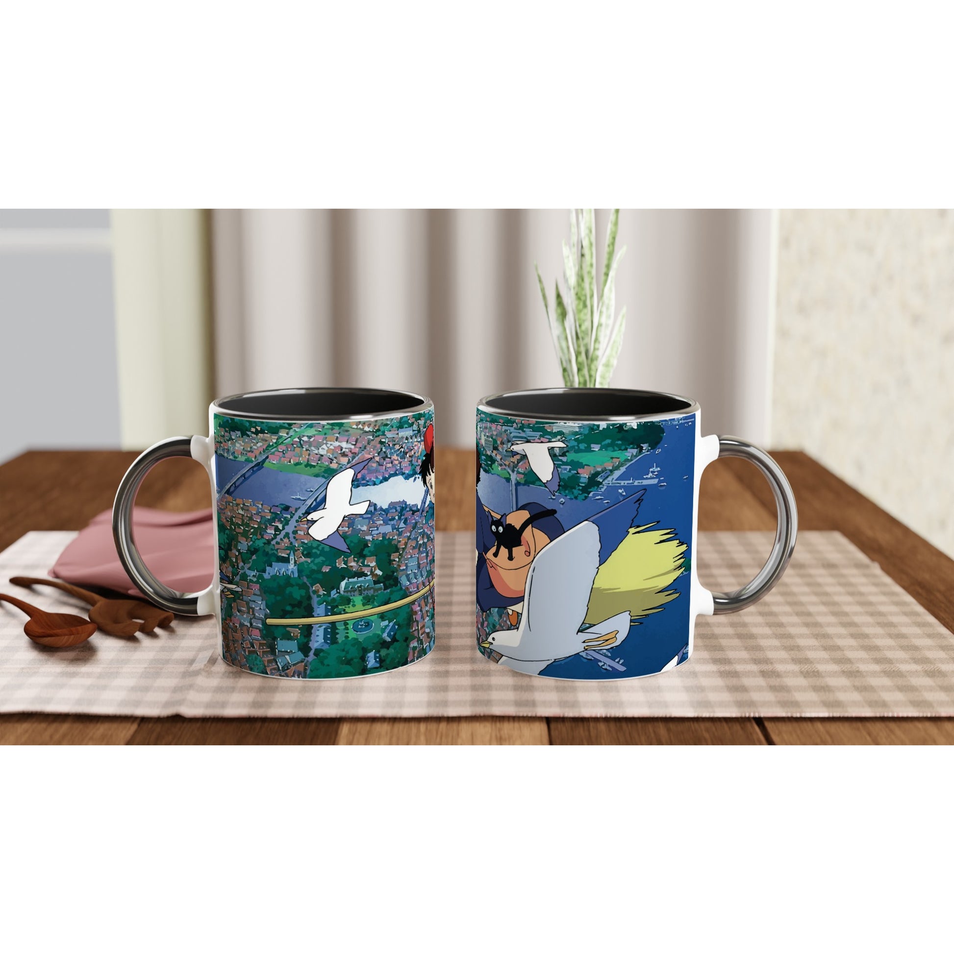 A ceramic mug depicts Kiki flying over Koriko with Gigi, inspired by Studio Ghibli's Kiki's Delivery Service.