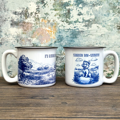 Two white mugs with blue Stardew illustrations and text on a wooden surface.