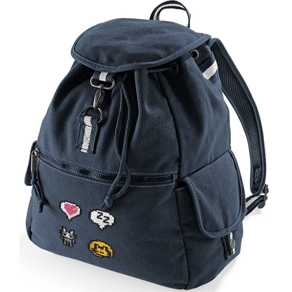 A navy blue canvas backpack features pixelated designs of cats and a heart emote referencing the Stardew Valley video game.