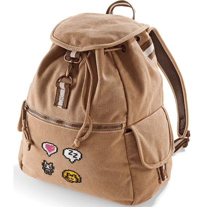 A brown canvas backpack features pixelated graphics including a heart emote and other icons referencing the Stardew Valley video game.