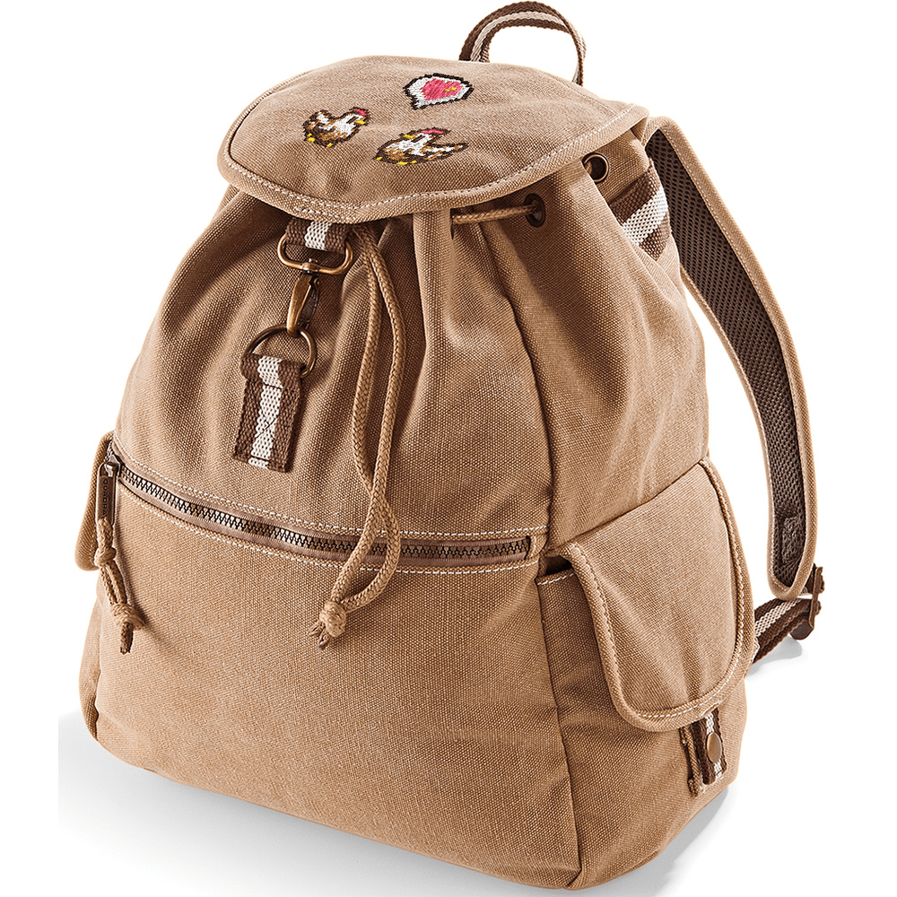 A tan canvas backpack features embroidered chickens and a heart emote design inspired by Stardew Valley.