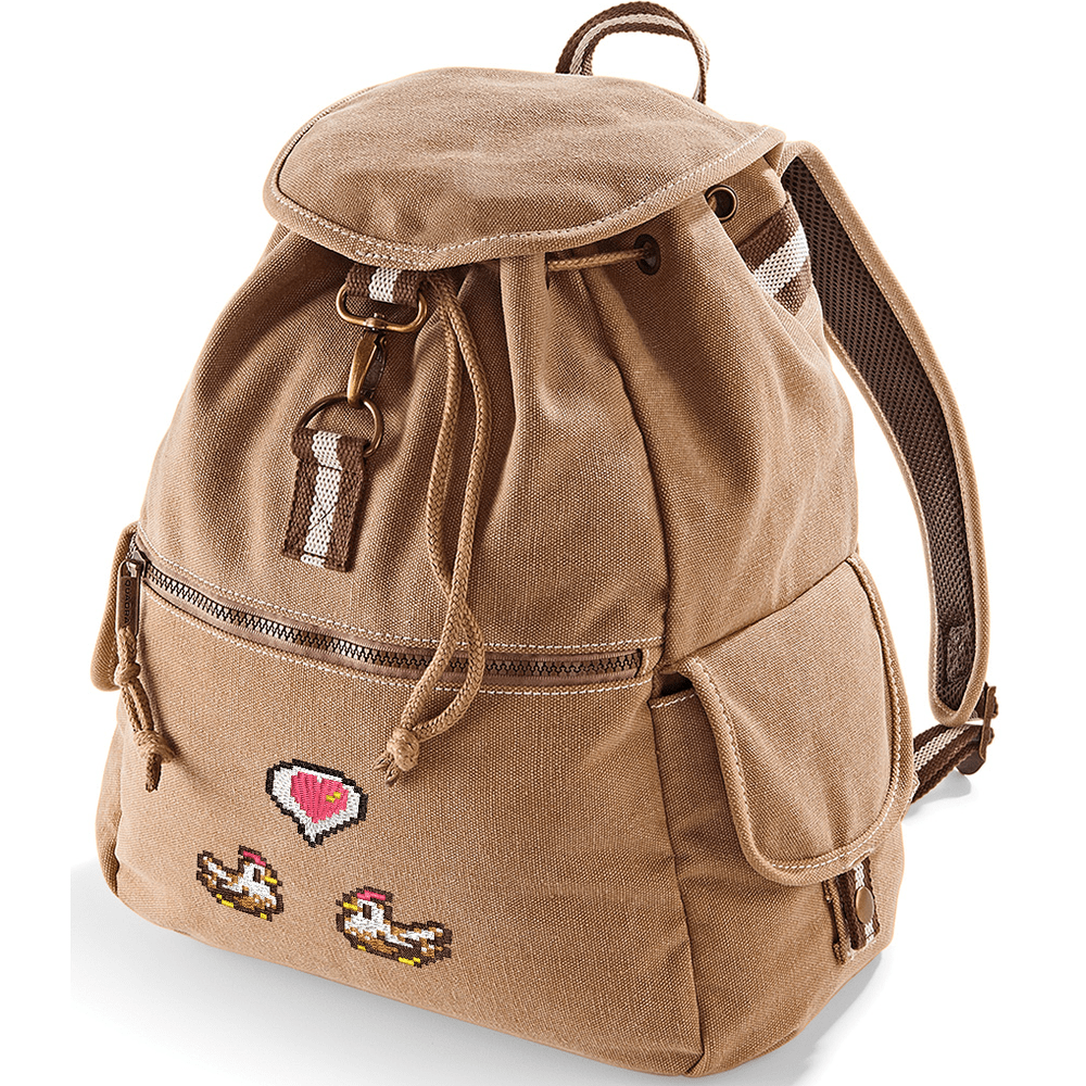 A brown canvas backpack features embroidered pixel art of chickens and a heart emote referencing the Stardew Valley video game.