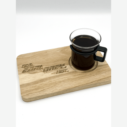 A wooden chopping board featuring a carved recess for a mug of tea and the inscription "Tea, Earl Grey, Hot" referencing Star Trek: The Next Generation.