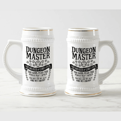 Two white ceramic Dungeon Master tankards, resembling a beer stein, feature gold accents and D&D-themed text and imagery.