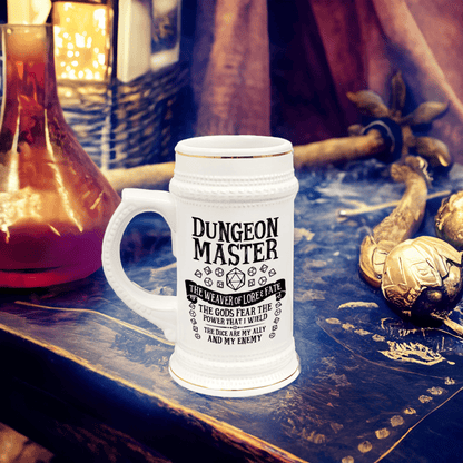 A white ceramic Dungeon Master tankard features gold accents and D&D-themed text and dice graphics.