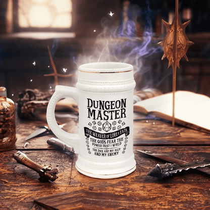 A white ceramic Dungeon Master tankard, resembling a DnD beer stein, sits on a table surrounded by fantasy-themed props and dice.