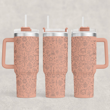 A pink D&D Engraved 40oz Tumbler displays a pattern of RPG Essentials icons including dice and adventure symbols.