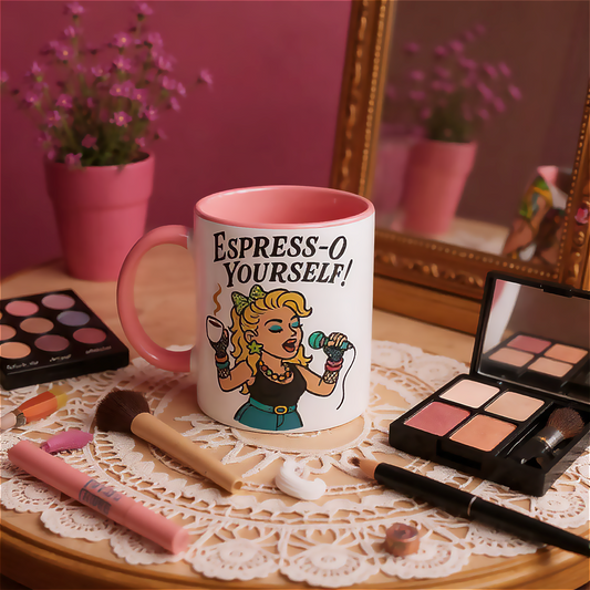 Retro mug with 'Espress-O Yourself!' pop diva Madonna style design on a table with 80s makeup items and a pink wall.