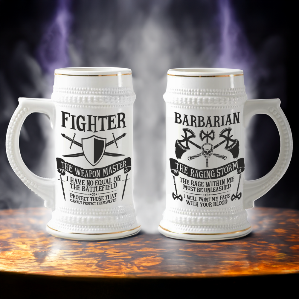 A white ceramic tankard features "Fighter" and "Barbarian" D&D character class designs along with decorative gold accents and a hinged lid.