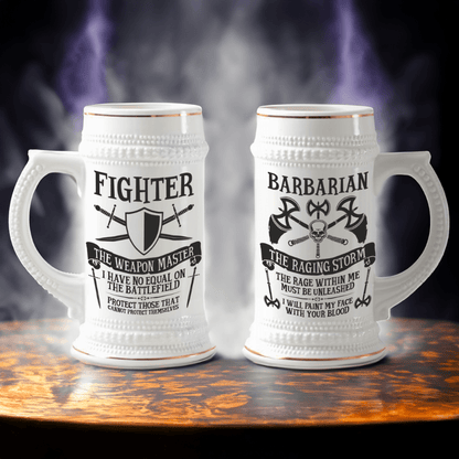 A white ceramic tankard features "Fighter" and "Barbarian" D&D character class designs along with decorative gold accents and a hinged lid.