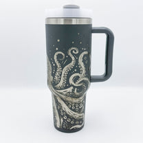 A dark gray 40oz tumbler features an engraved design of octopus tentacles inspired by Cthulu and D&D themes.