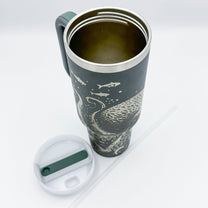 A gray 40oz tumbler features an engraved design of a Kraken with tentacles and fish, inspired by D&D and Cthulu themes.
