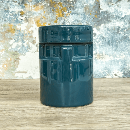 This is a teal ceramic mug designed to resemble a Raktajino dispenser from Star Trek: Deep Space Nine (DS9).