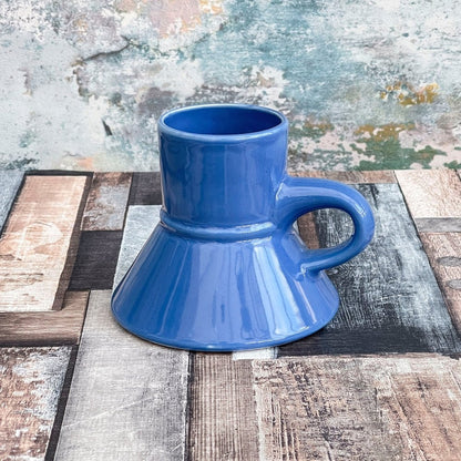 This is a blue Replimat mug resembling a Raktajino cup from Star Trek: Deep Space Nine.