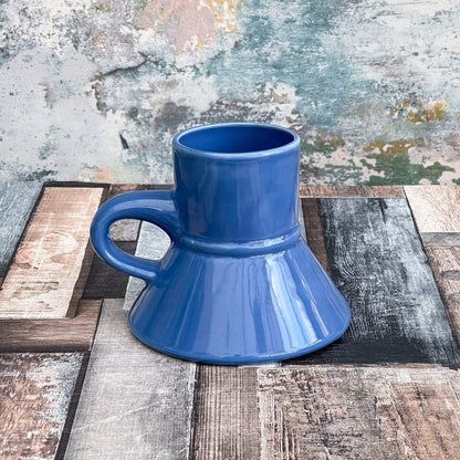 This is a blue Replimat mug resembling a Little Blue Raktajino cup from Star Trek: Deep Space Nine.