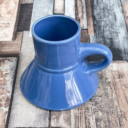This is a blue replica Replimat mug inspired by Raktajino from Star Trek: Deep Space Nine.