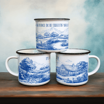 Three enamel camping cups feature a blue and white Stardew Valley chinoiserie design depicting landscapes and buildings.