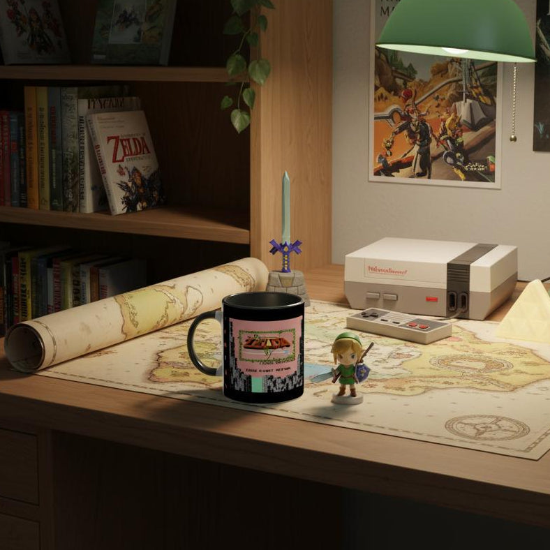Desk setup with a Retro Zelda mug, map, and gaming console in a room decorated with 'The Legend of Zelda' posters.
