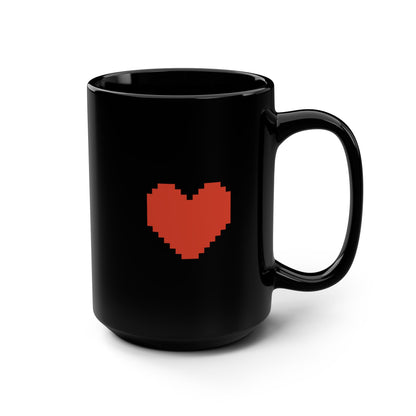 A black mug from Undertale features a pixelated red heart graphic on its front.