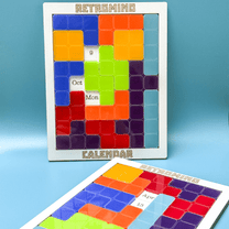 A RetroMind KronoBlox puzzle calendar displays colorful tetromino blocks arranged to show October 9th on a Monday.