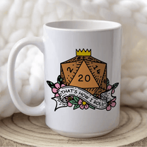 A white mug displays a D&D-themed design featuring a orange twenty-sided die (d20) surrounded by flowers and the phrase "That's How I Roll".
