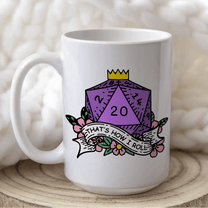 A white mug displays a D&D-themed design featuring a purple twenty-sided die (d20) surrounded by flowers and the phrase "That's How I Roll".