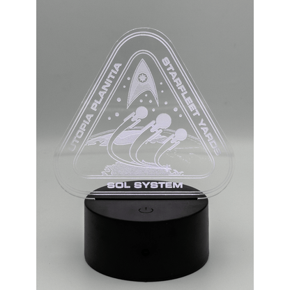 The LED engraved acrylic lamp depicts a Starfleet shipyard scene labeled "Utopia Planitia" and "Sol System.