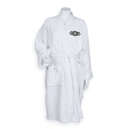 A white terry cloth bathrobe features an embroidered Vault Tec logo with the number 32 on the sleeve, referencing the Fallout video game series.