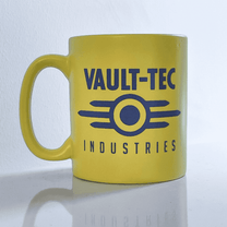A yellow Fallout mug displays the Vault-Tec Industries logo in blue.