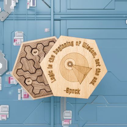 A wooden Star Trek inspired puzzle featuring a Vulcan hexomino date game design and engraved quote attributed to Spock sits on a blue patterned surface.
