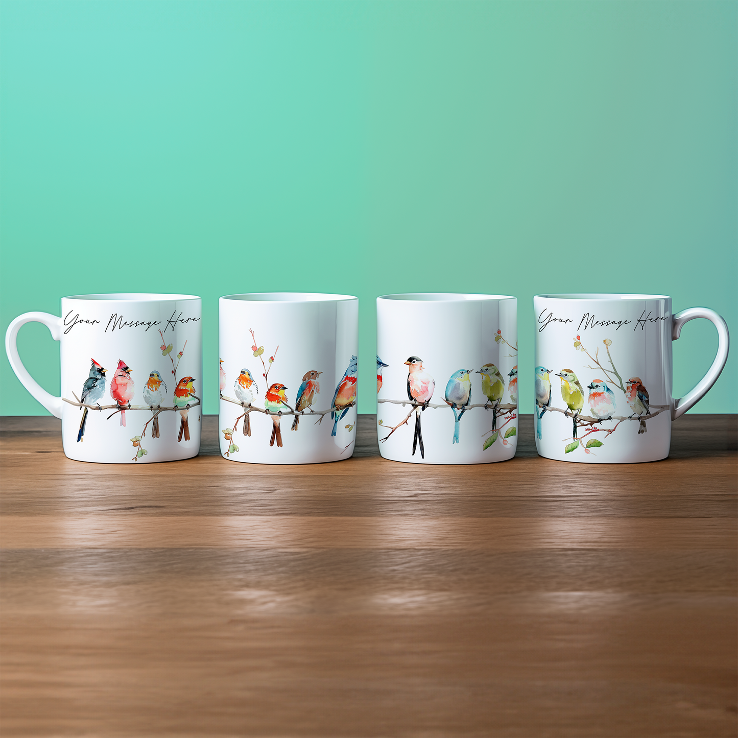 Four white china mugs display watercolour illustrations of birds perched on a branch, each featuring space for personalized text.