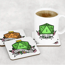 A white mug and two coasters display a D&D-themed design featuring a critical fail green D20 die and the words "Well Shit / That's How I Roll.